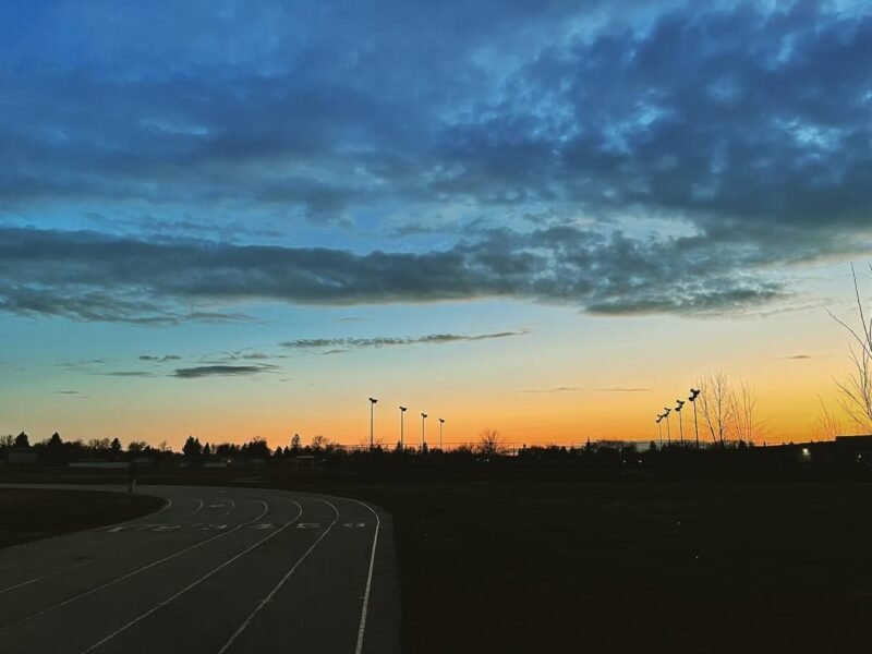 Track at dusk, prairie sunset