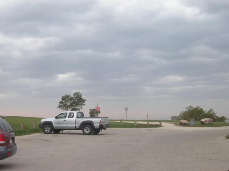 Prairie parking lot, overcast sky
